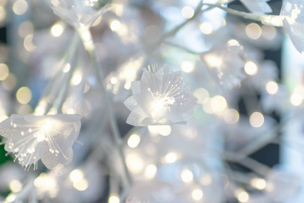 Christmas new year concept christmas lights background.Blurred white nice lights.Close up.