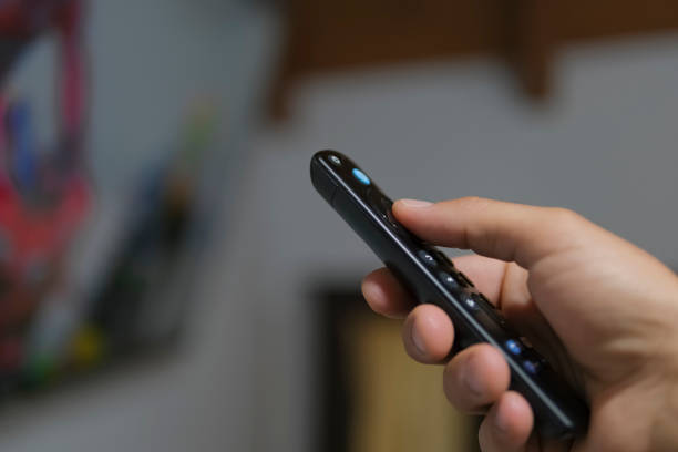 istock Man browse smart tv app,zapping channels on leisure time,tech lifestyle 1783723729