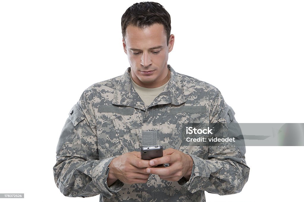 Serviceman enviar mensagens de texto - Royalty-free Branco Foto de stock