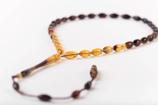 istock Yellow and browns rosary beads, prayer beads 1783727921