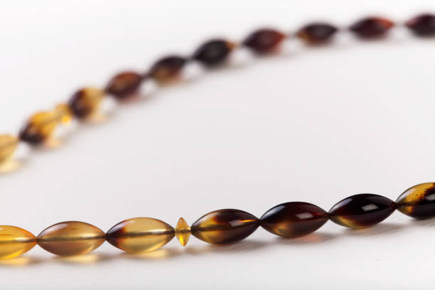 istock Yellow and browns rosary beads, prayer beads 1783728455