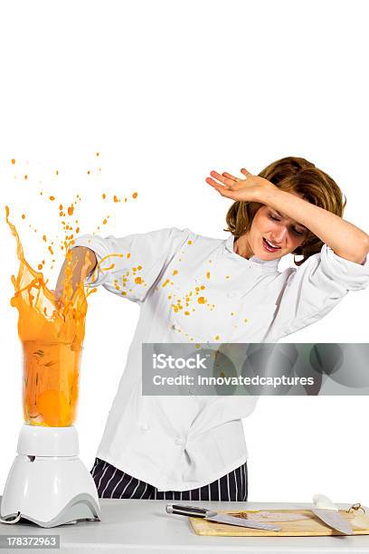 Female Chef Making A Mess With A Blender Stock Photo - Download Image Now - Messy, Spilling, Blender