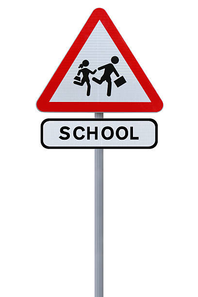 снова в школу - crossing education child school crossing sign стоковые фото и изображения