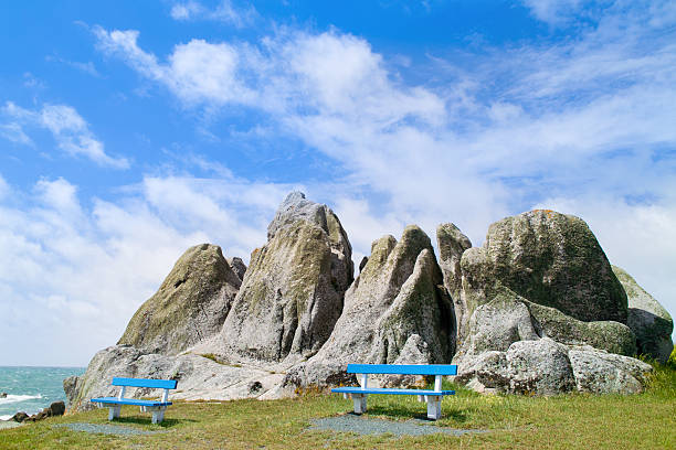 bench and rocks in landscape in brittany lesconil