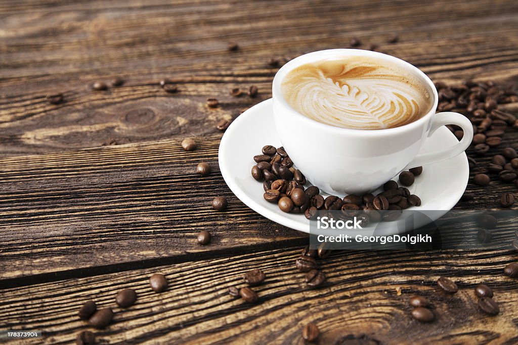 Cup of coffee Cup of coffee on a wooden table Art Stock Photo