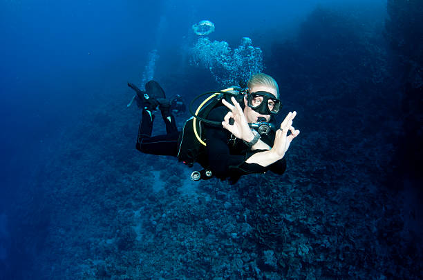 istock scuba diver gives OK sign 178374281