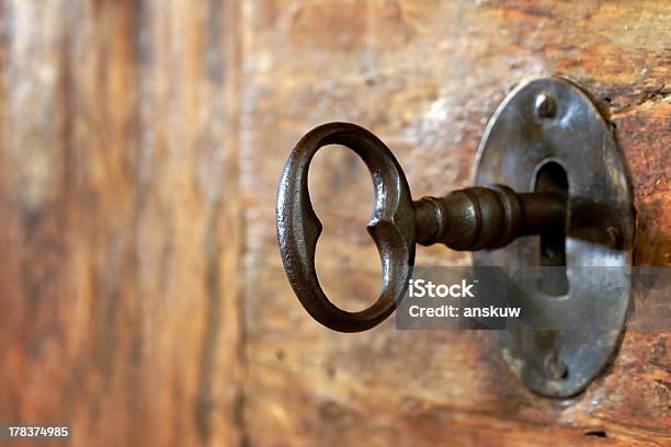 Closeup Of An Old Keyhole With Key Stock Photo - Download Image Now - Key, Lock, Old