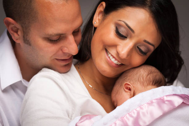 istock Mixed race family welcomes newborn daughter  178376237