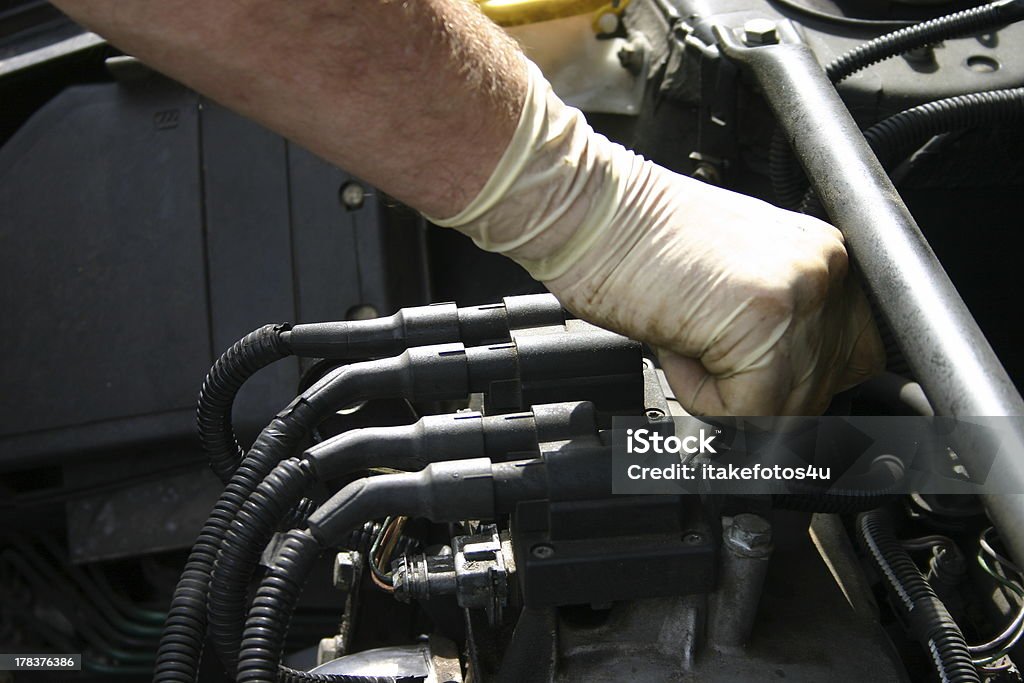 Repairing  an old car Repairing an old car.Similar or related pictures:See Lightbox aa Cars Ignition Stock Photo