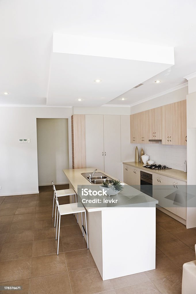 kitchen in a new modern home White kitchen in a new modern home Appliance Stock Photo