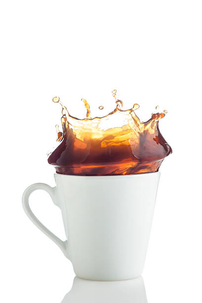istock Splash of coffee in white cup 178377286