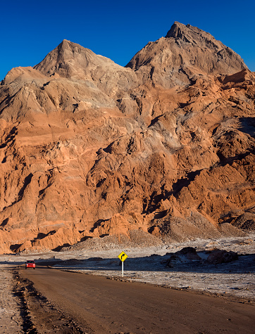 Desert road through the Valley of the Dead in the Atacama Desert in northern Chile, South America.
