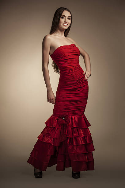 istock girl in red dress 178377800