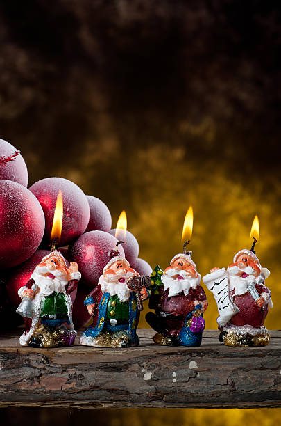 istock Four Santa Claus candles 178378033