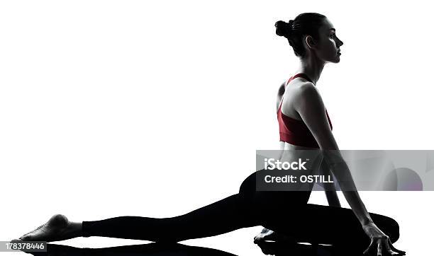 Woman In Red Tank Top Doing Dynamic Stretching Stock Photo - Download Image Now - Adult, Adults Only, Aerobics