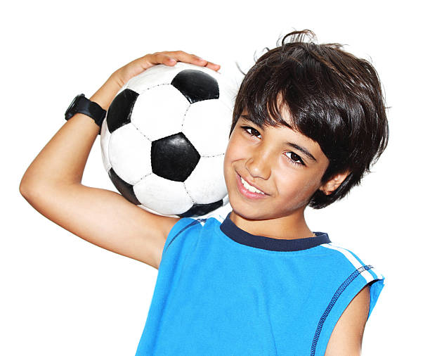 istock Cute boy playing football 178378776