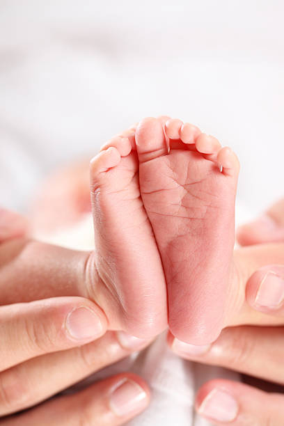 istock Newborn Baby feet 178378913