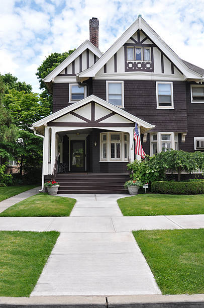 Suburban Victorian Home American Flag stock photo