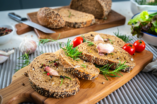 Toasted bread with garlic, salt and rosemary