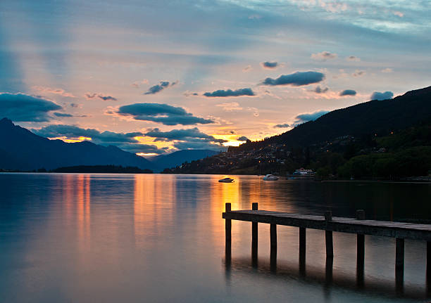 istock Wooden Dock on a Mountain Lake Sunset 178380110