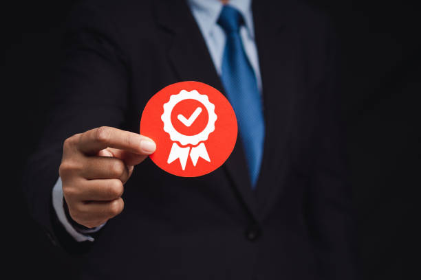 istock The best quality symbol assurance for a product, service, and ISO certification on a hand businessman 1783812216