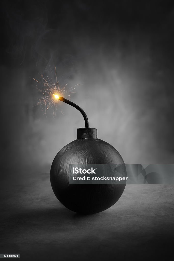 Bomb A Cartoon-style round black bomb with a burning fuse. Explosive Fuse Stock Photo