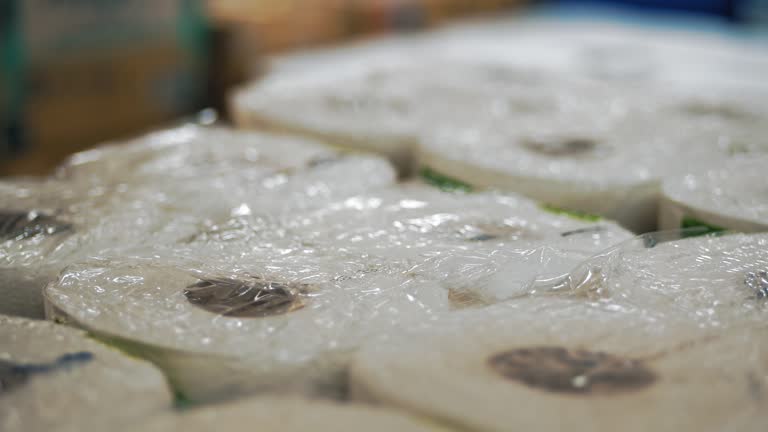 toilet paper in the supermarket. close-up. Large packaging with toilet paper and paper towels. Personal hygiene products. shopping.