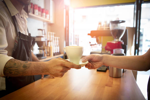 istock Barista giving cup of coffee 1783819658