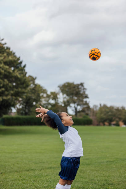 istock Throwing a Football in the Air 1783828430