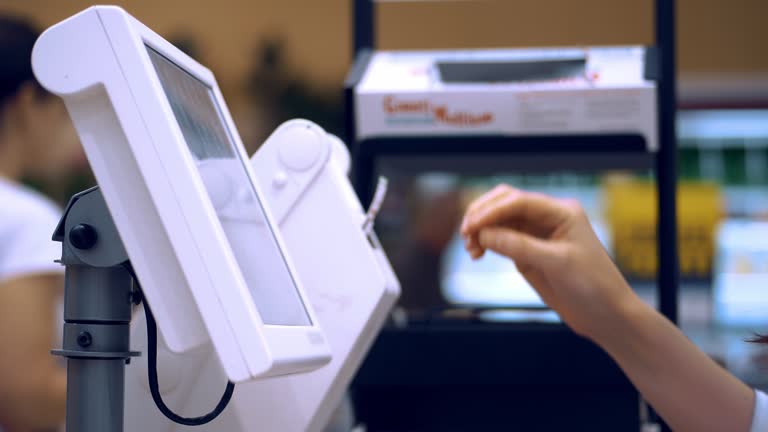 self-service scales. close-up. weighing fruits and vegetables in grocery supermarket. sticker with the indicated weight and cost for vegetables and fruits.
