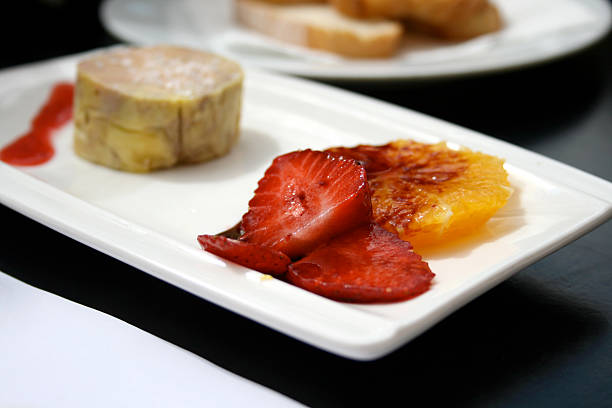 Pâté and strawberries stock photo