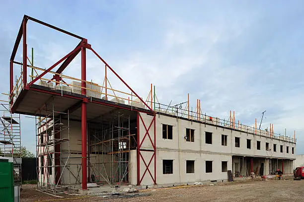 Modern office building with steel and concrete under construction