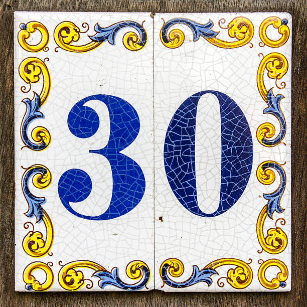 House number 30 two crackled ceramic tiles with house number thirty ceramic tile house numbers stock pictures, royalty-free photos & images