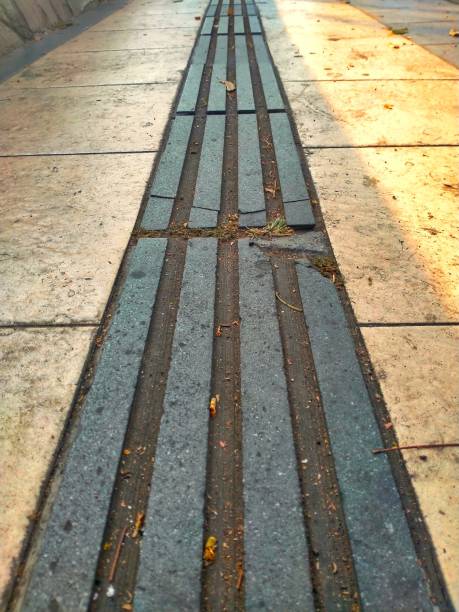istock Tiles guide for the blind on the sidewalk 1783837746