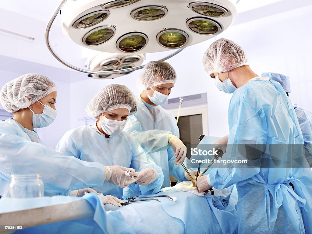 Surgeon at work in operating room. Team surgeon at work in operating room. Surgery Stock Photo