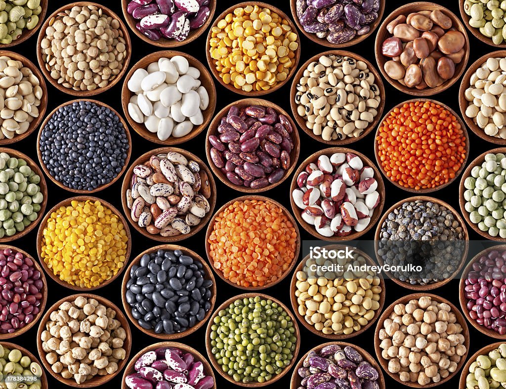 Seamless texture with legumes Seamless texture with legumes on black background Legume Family Stock Photo