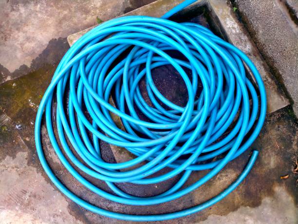 Blue hose reel on the floor