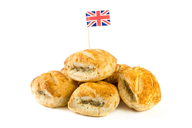 istock Pile of sausage rolls with union jack flag 178384676