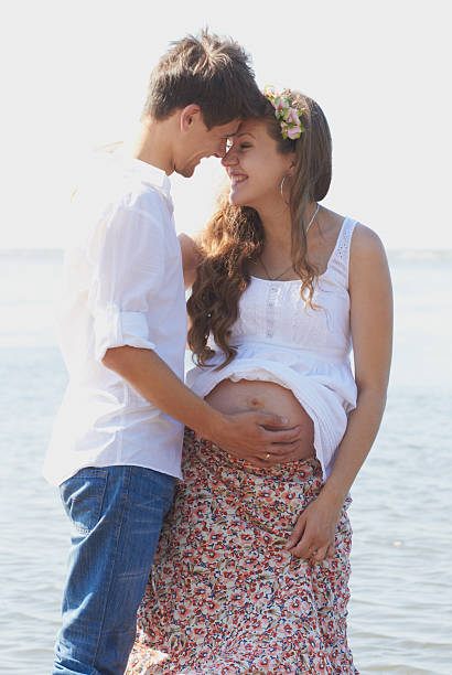 istock Happy pregnant girl and her loving husband 178384708