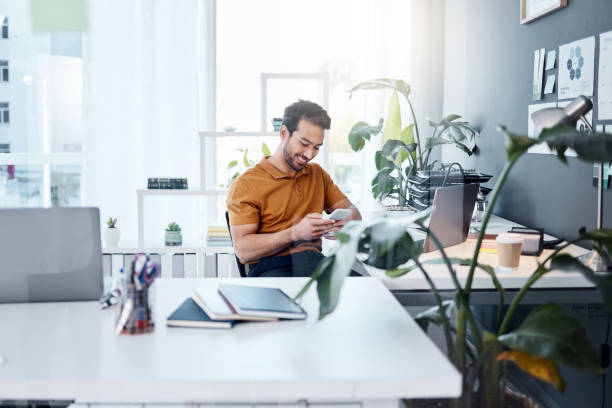 istock Phone communication, relax and happy man typing, networking and search website, app or online social network. Sitting, mobile smartphone and Asian person texting, message or contact cellphone user 1783849611