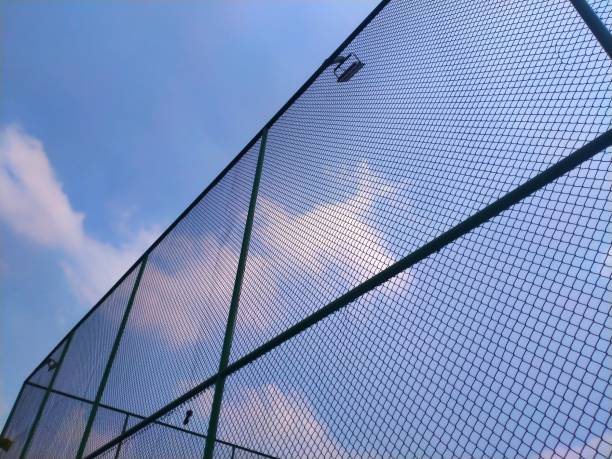 Woven wire mesh for two-area fence