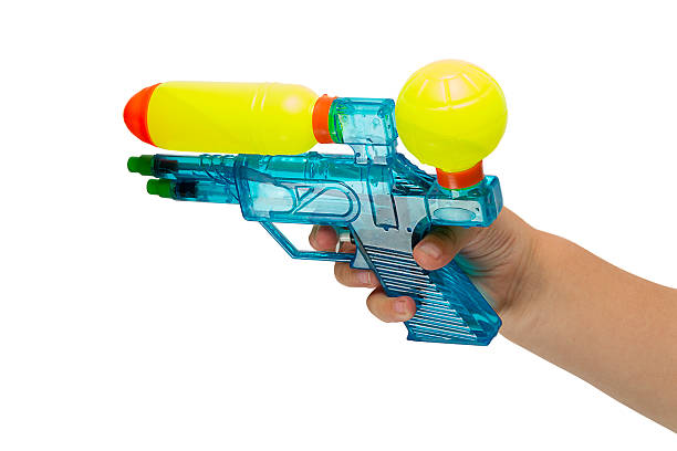 istock Child with a water pistol 178385912