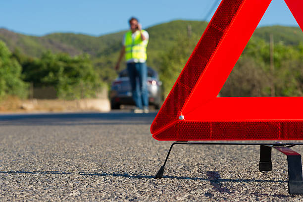 istock Red hazard sign alerting others of a broken down car  178385936