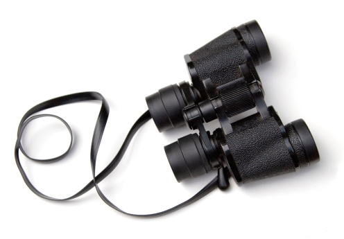 Pair of binoculars on a white background