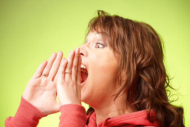 istock Beautiful woman loud screaming 178386113