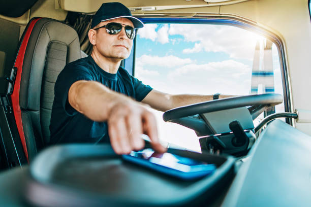 istock Professional truck driver sitting in truck 1783865763