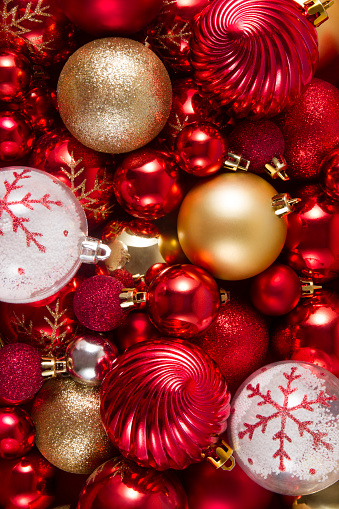 Gold silver and red colored Christmas ornaments background