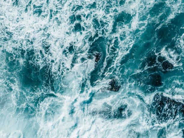 istock Large waves of turquoise rough sea from above 1783866914