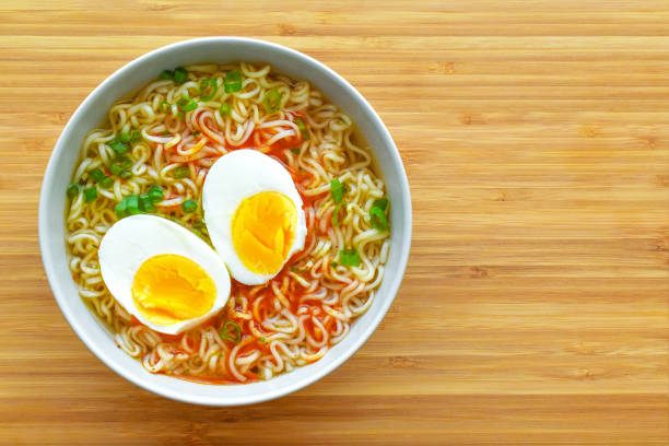 istock Instant noodles with boiled egg and spring onion in a bowl. 1783866941