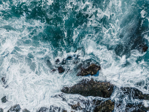 istock Large waves of turquoise rough sea from above 1783867482